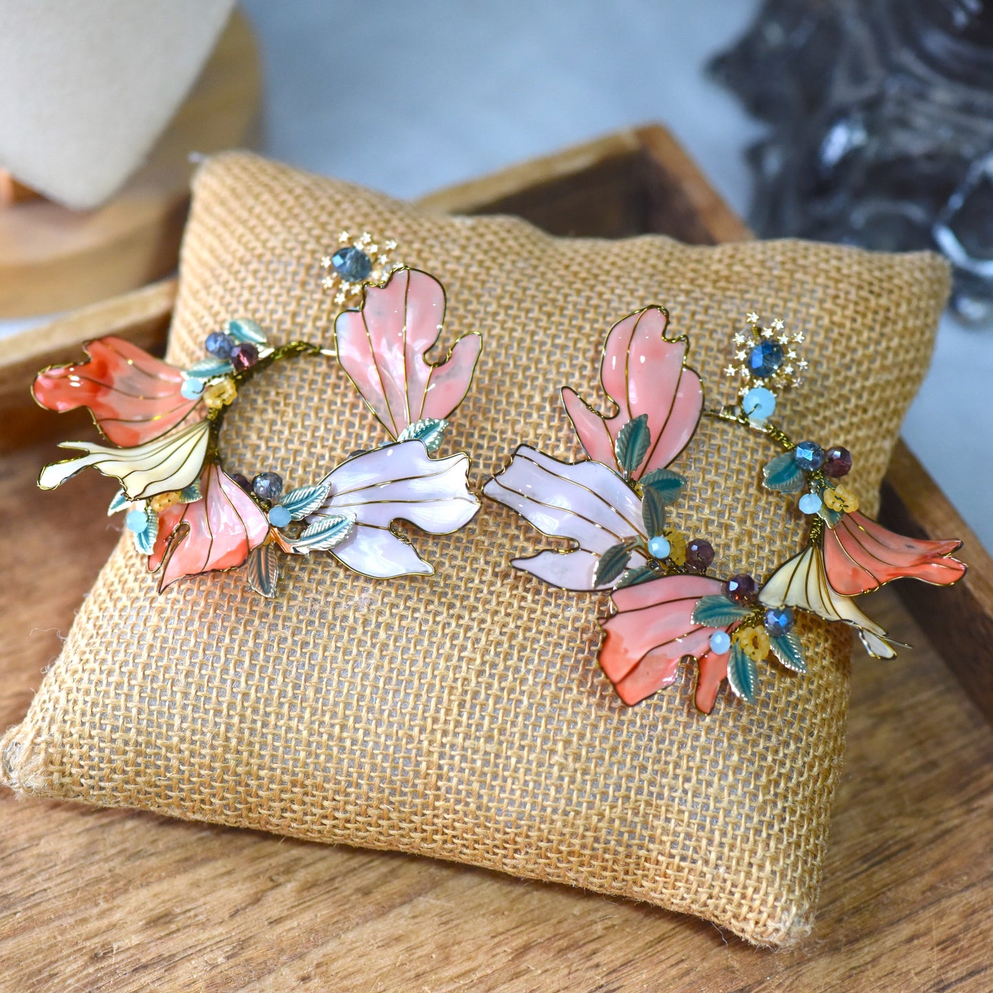 Alicia handcrafted floral resin earrings featuring blush pink, coral peach and ivory petals with pastel accents and soft gold wire detailing