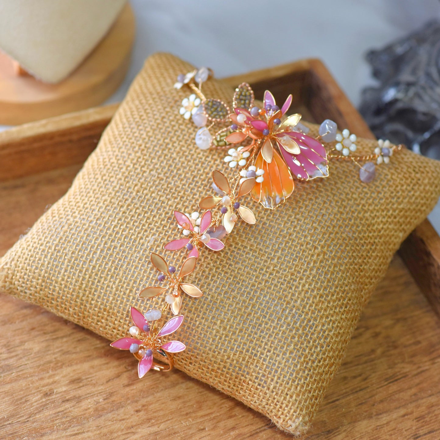 Catriona handcrafted resin floral haath phool hand harness pink orange gold from jewellery set flat lay
