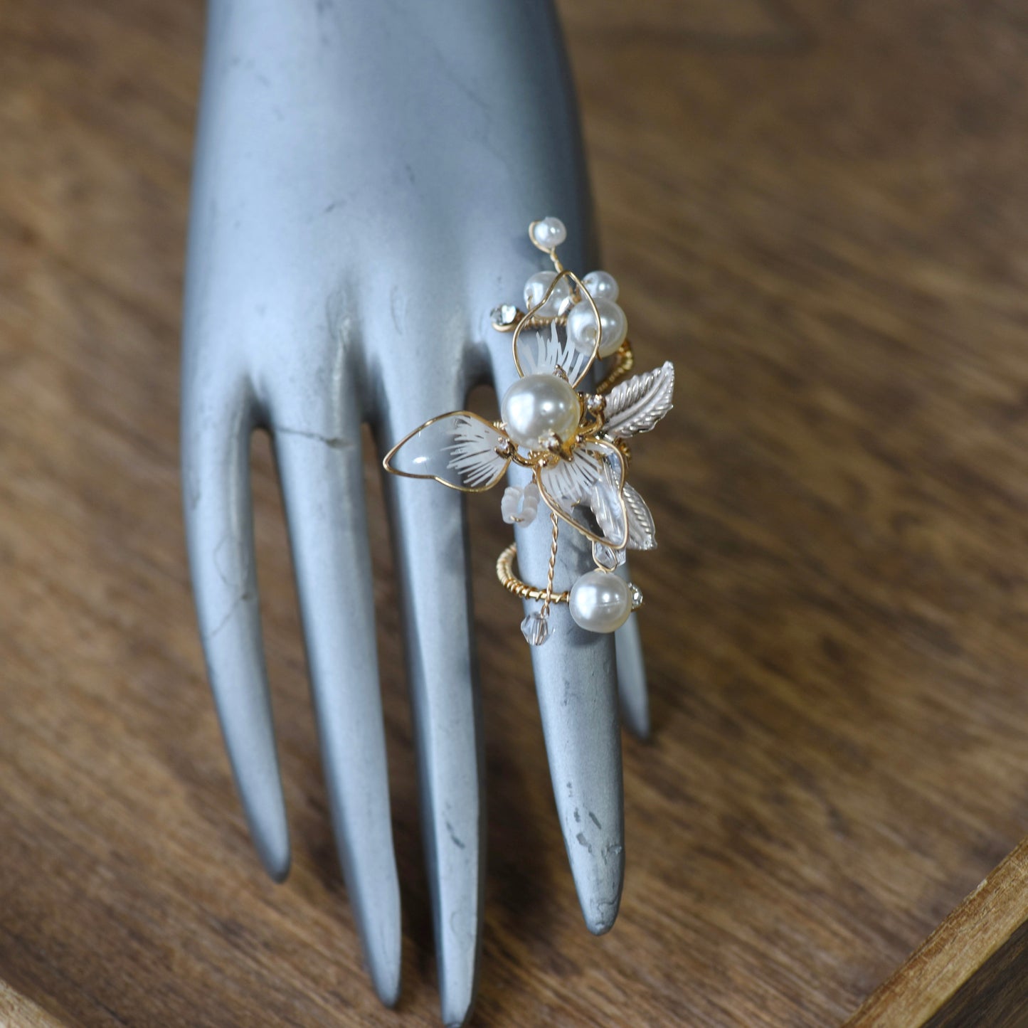 Juliana white and pearl resin floral adjustable ring worn on hand