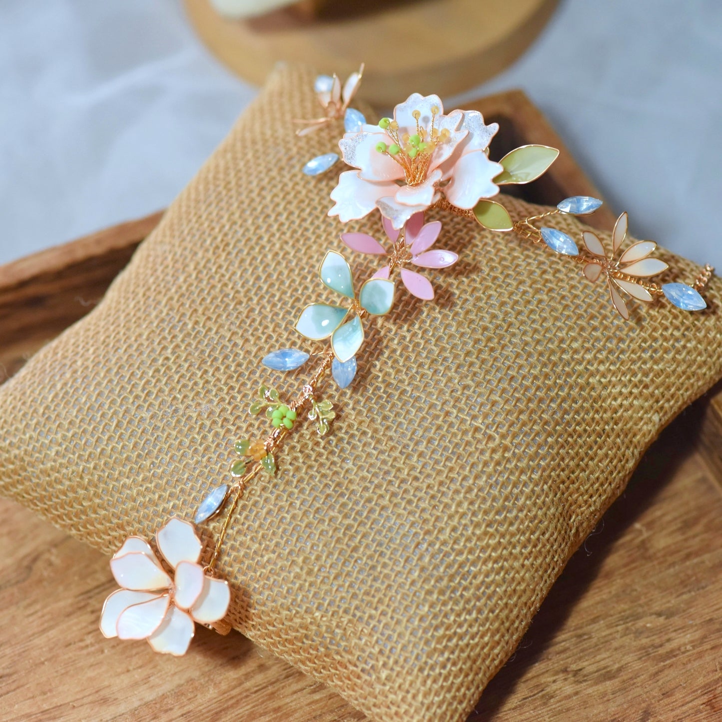 Sadie handcrafted floral hand harness with pastel resin petals and gold detailing