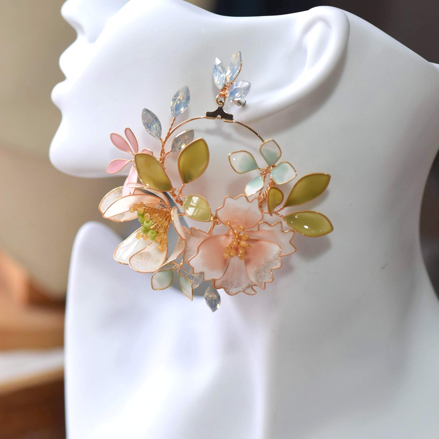 Sadie handcrafted pastel resin floral hoop earrings blush pink lavender mint powder blue gold on mannequin bridal