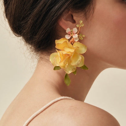 yellow earrings, close up shot on a model