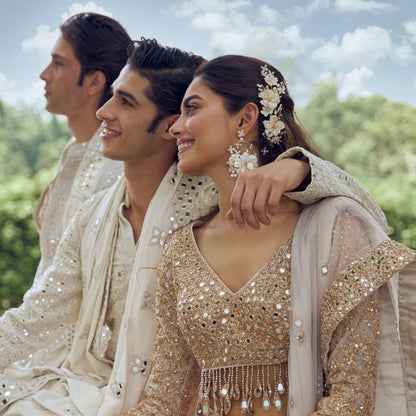 Amara handcrafted white resin floral earrings gold accents Abhinav Mishra collaboration bridal editorial 4
