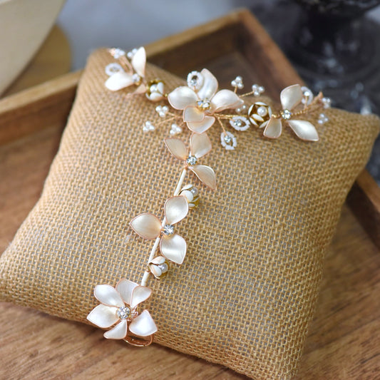 Amarille ivory and golden yellow resin floral hand harness haath phool on jute cushion
