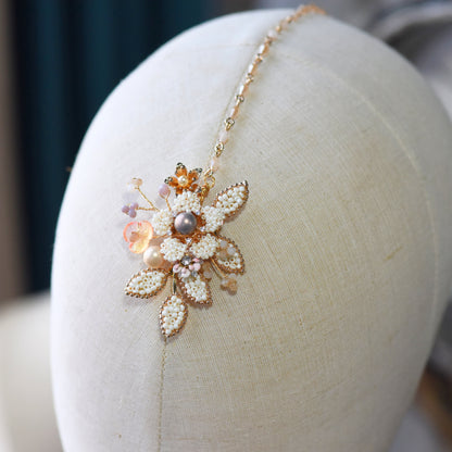 Arabella handcrafted metal bead pearl maang tika floral bead detail golden cream lavender blush close-up
