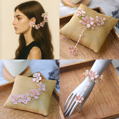 Aubri bridal set pink floral hair harness and hand harness displayed together

