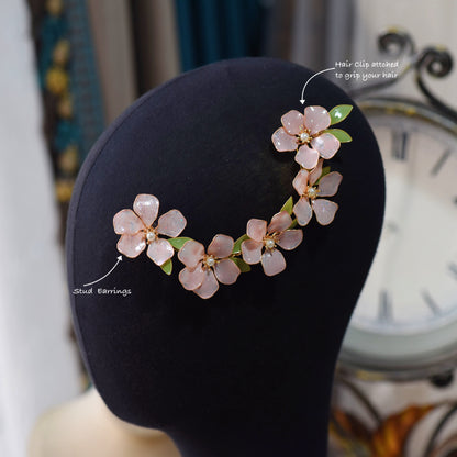 Aubri earrings with pink floral hair harness styled on display bust
