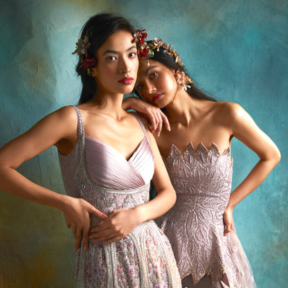 Ayaka peach and mint resin floral earrings worn with a pale lilac dress
