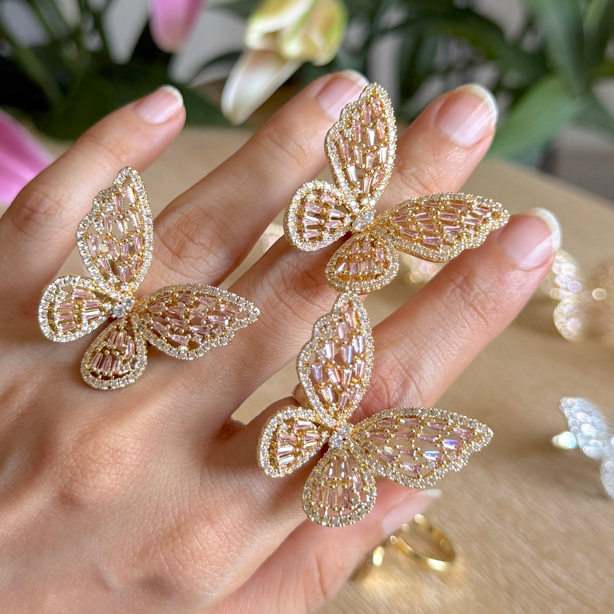 Butterfly Ring worn on hands, close-up
