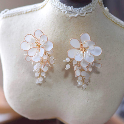 Calla handcrafted white ivory resin floral statement drop earrings bridal wedding rose gold opalescent The Vintage Snob
