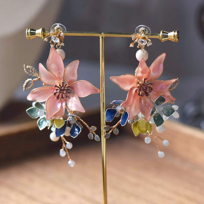 Camille handcrafted blush pink resin floral drop earrings teal slate blue crystal accent gold wirework detail
