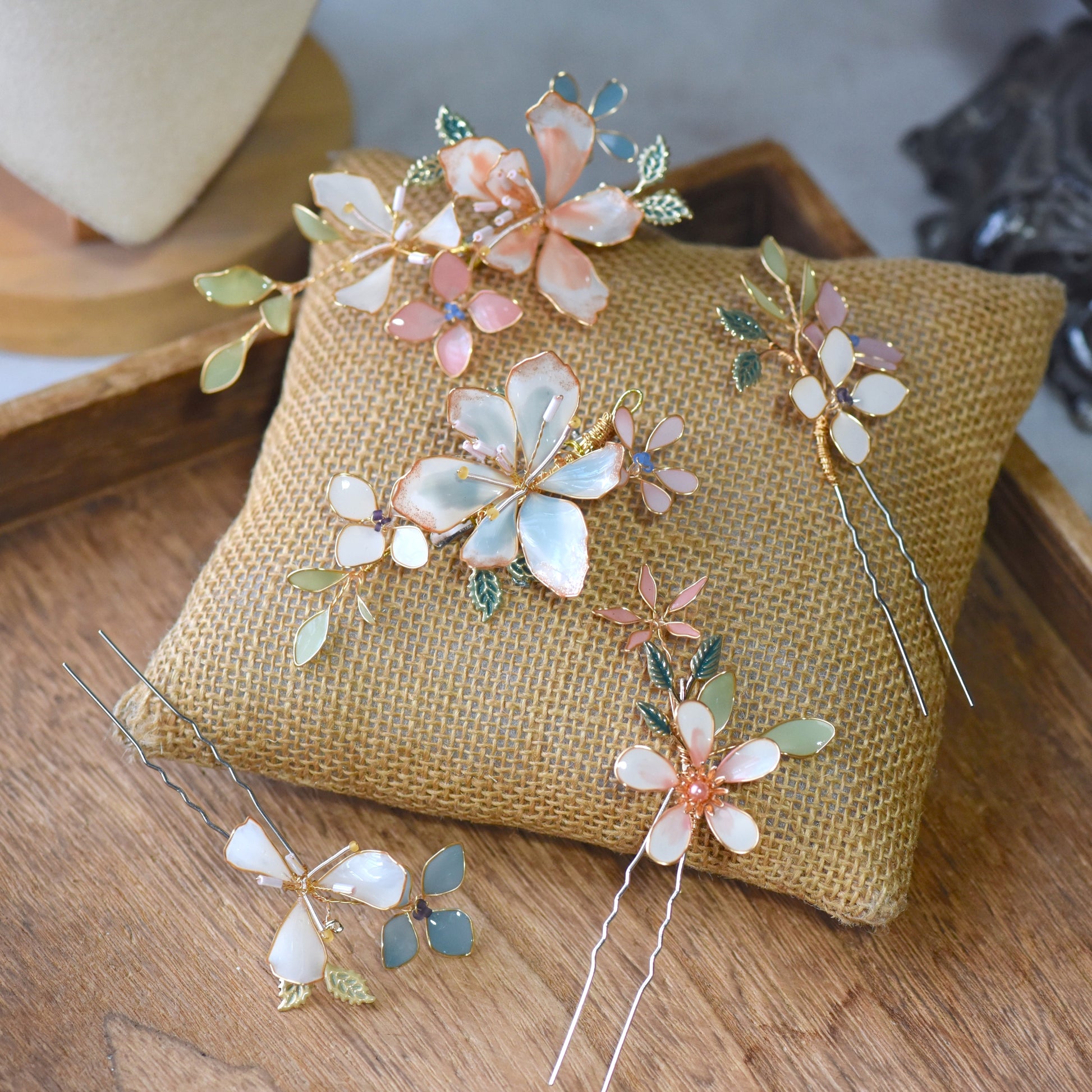 Candace handcrafted floral hair clips set of five featuring blush pink and ivory flowers with pastel foliage and soft gold detailing