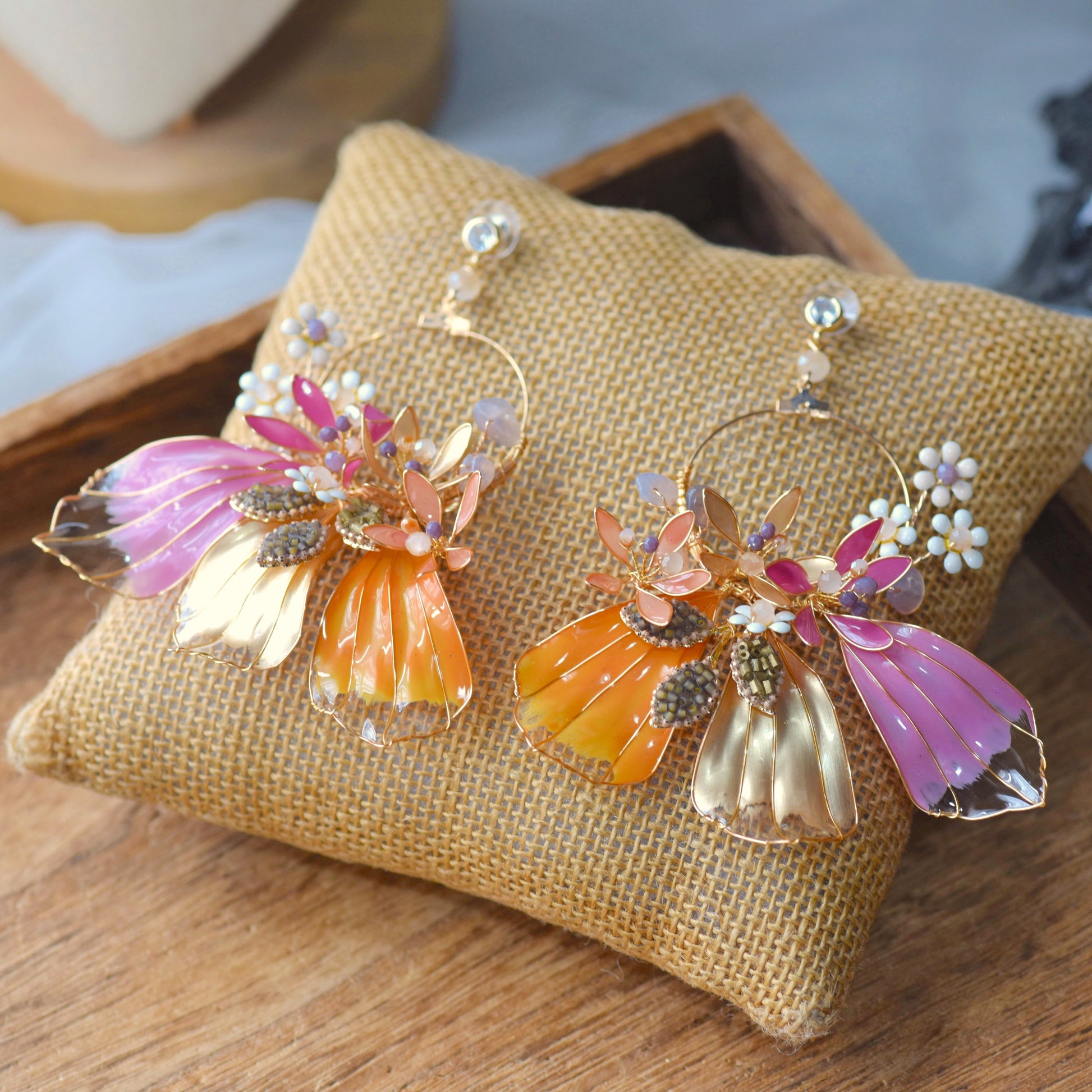 Catriona handcrafted resin floral jewellery set components pink orange gold earrings detail flat lay

