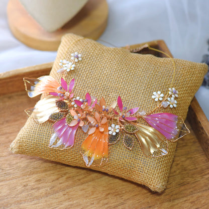 Catriona handcrafted resin floral necklace pink orange gold from jewellery set flat lay burlap
