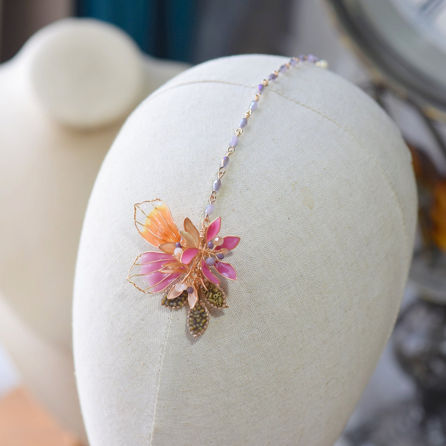 Catriona handcrafted resin floral maang tikka pink orange lavender gold on white bust bridal headpiece
