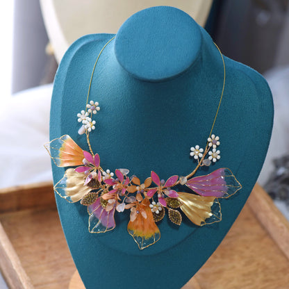Catriona handcrafted resin floral necklace pink orange gold on teal bust botanical statement necklace
