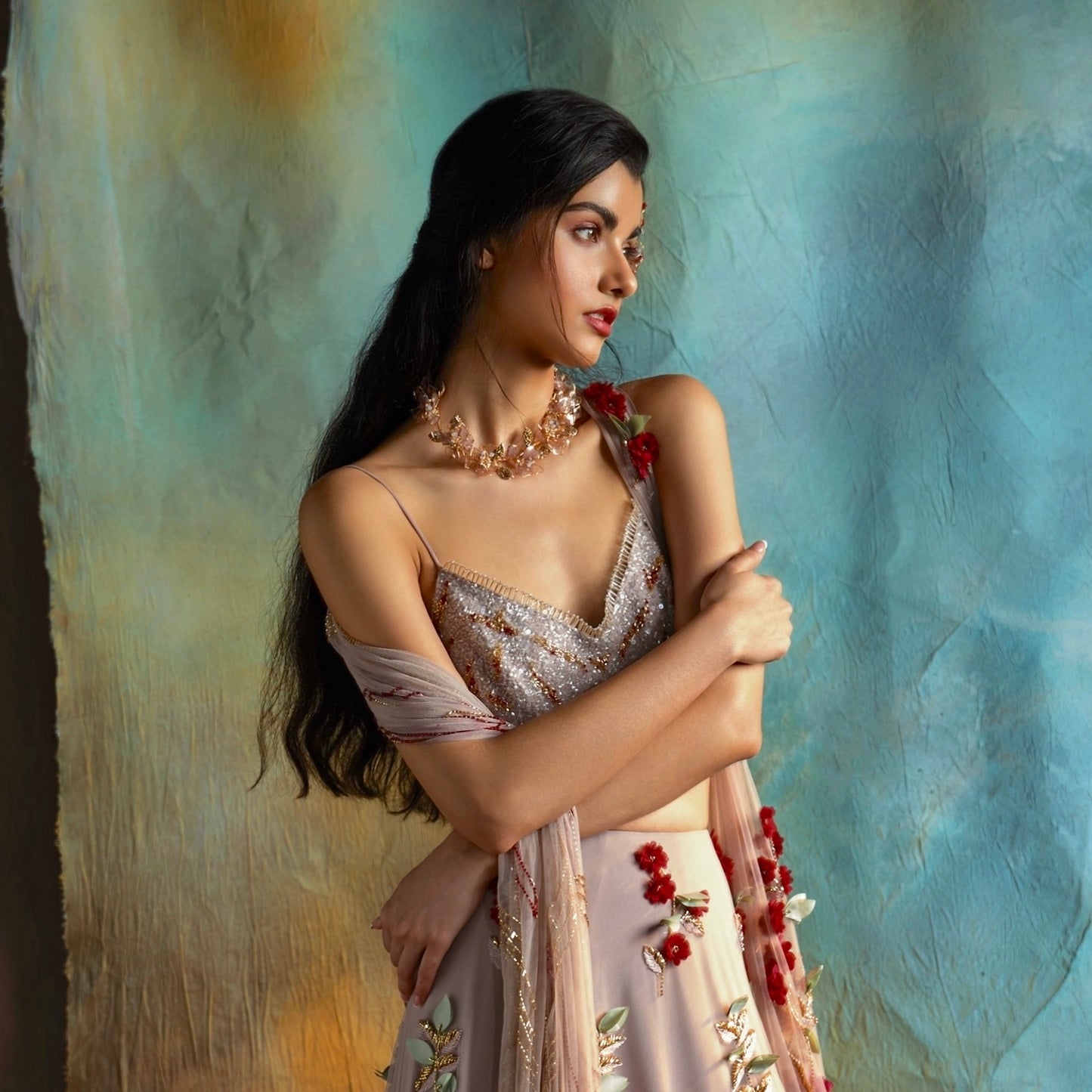 Model wearing Celestina handcrafted resin floral necklace pink gold with saree Indian styling
