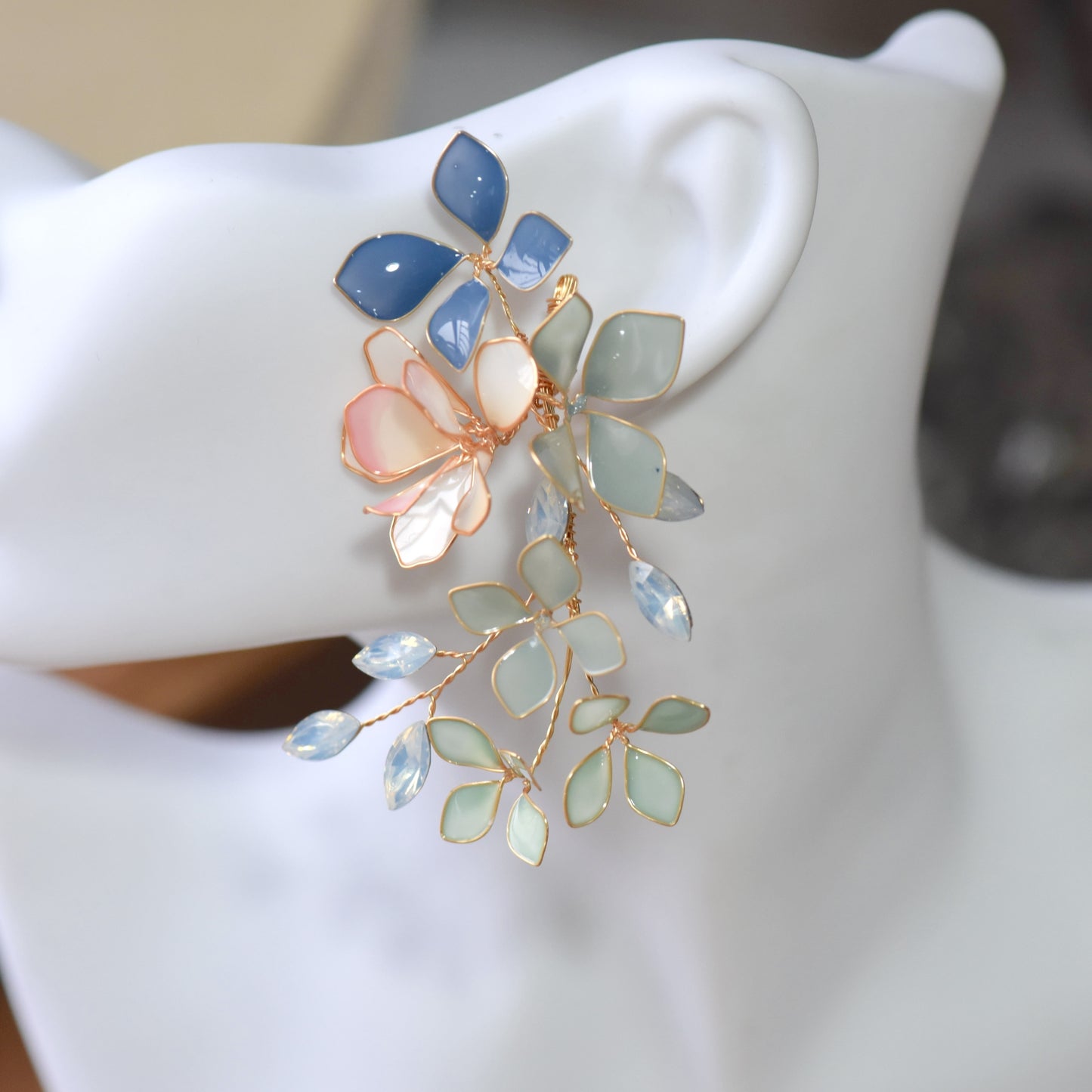 Ciel handcrafted blue botanical vine resin drop earrings cobalt navy powder blue mint grey blush bloom on mannequin
