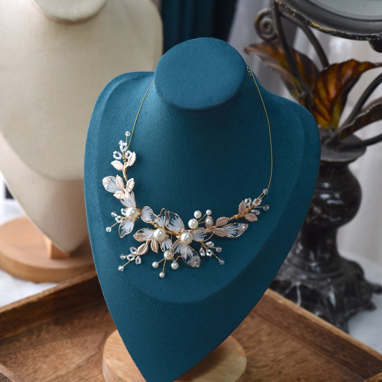 Juliana white and pearl resin floral bridal necklace displayed on bust
