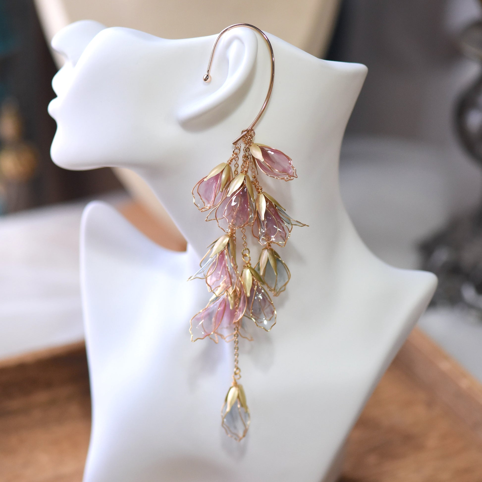 Julieta floral ear cuff with cascading resin petal drops in blush and mauve tones