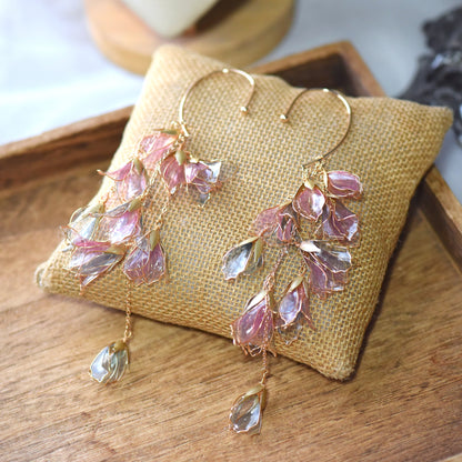 Julieta handcrafted floral ear cuff featuring blush pink translucent resin petals and gold detailing