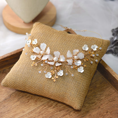 Lorelle handcrafted white resin floral vine necklace rose gold copper wire flat lay burlap cushion