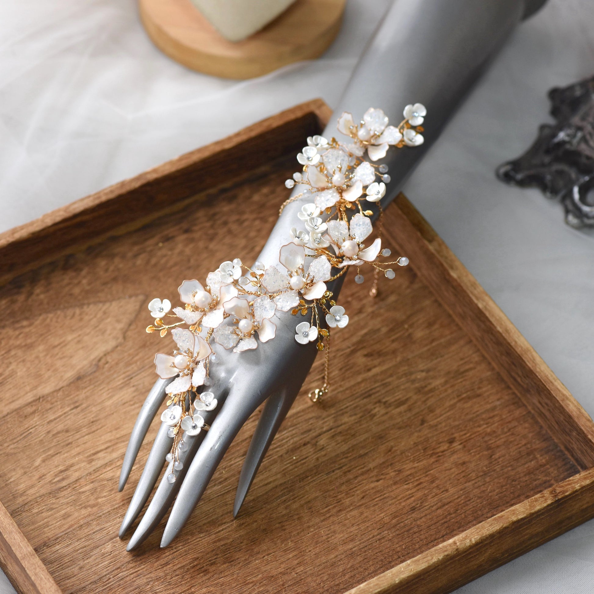 Lorelle handcrafted white resin floral hath phool hand harness rose gold copper wire on mannequin