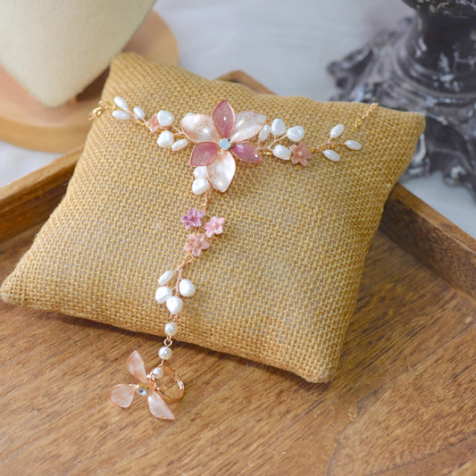 Madeline pink and lavender resin floral bridal hand harness haath phool on jute cushion
