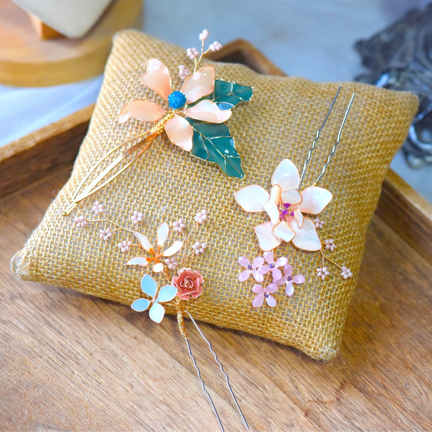 Handcrafted Micaela floral hair accessory featuring pastel resin flowers and botanical detailing