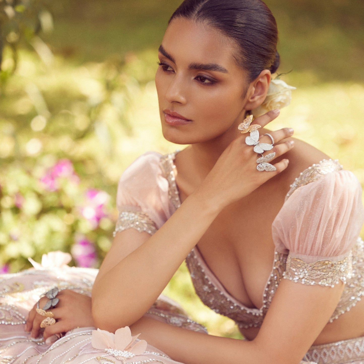 Model wearing the Moving Butterfly Ring in a bridal portrait
