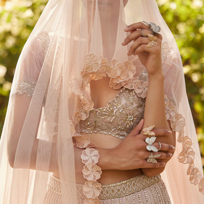 Model wearing the Moving Butterfly Ring in a bridal veil look
