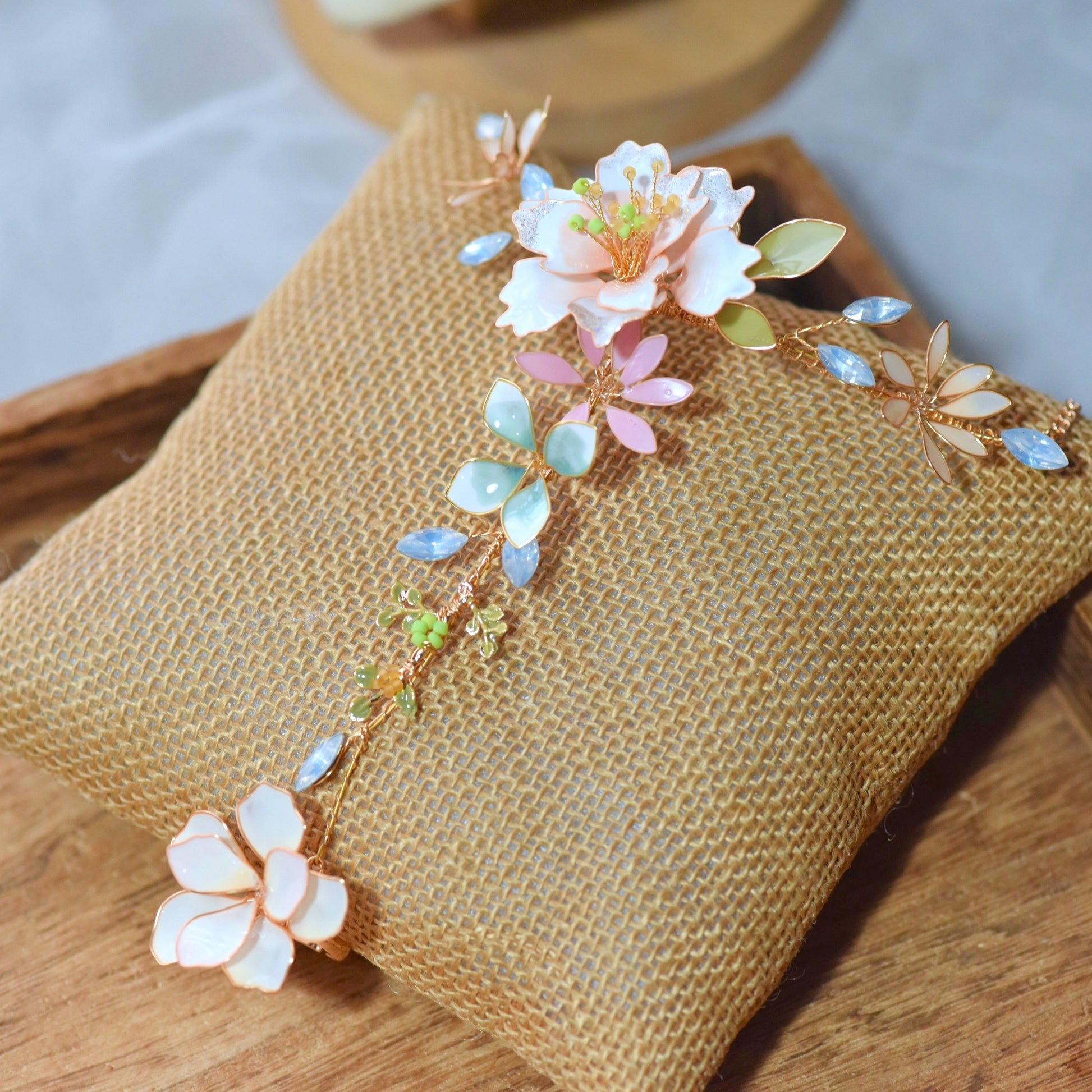 Sadie handcrafted floral hand harness with pastel resin petals and gold detailing