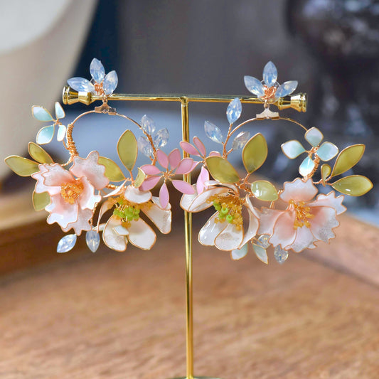 Sadie handcrafted pastel resin floral hoop earrings blush pink powder blue marquise crystal mint gold on stand
