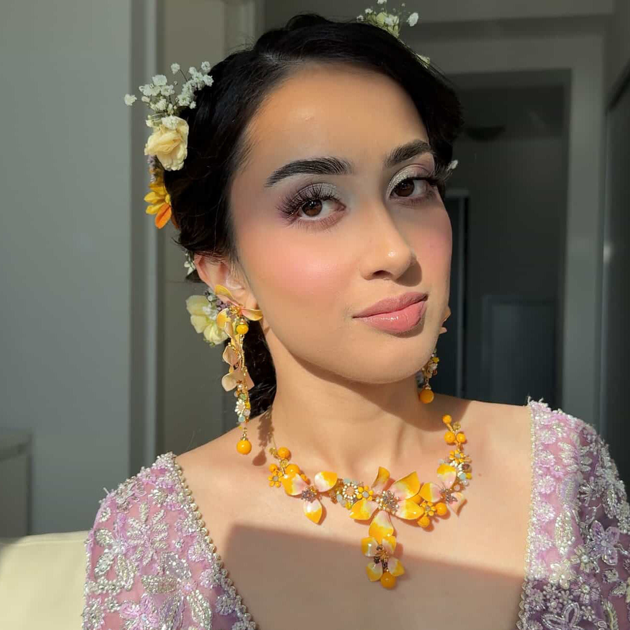 Looks by Hala wearing Seraphina handcrafted resin floral earrings and necklace yellow peach ivory The Vintage Snob viral look
