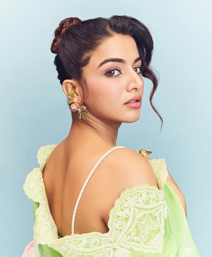 Valentina pink resin floral earrings worn by actress Wamiqa Gabbi, side-view
