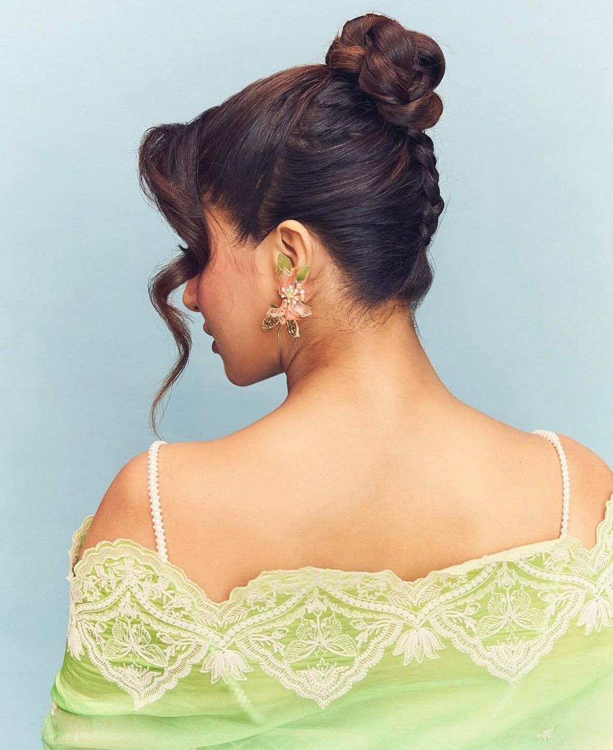 Actress Wamiqa Gabbi wearing Valentina pink floral earrings, back view
