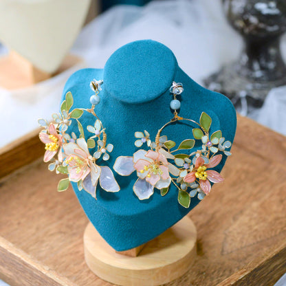 Zahara handcrafted resin floral hoop earrings blush pink lavender ivory sage green gold on teal velvet bust