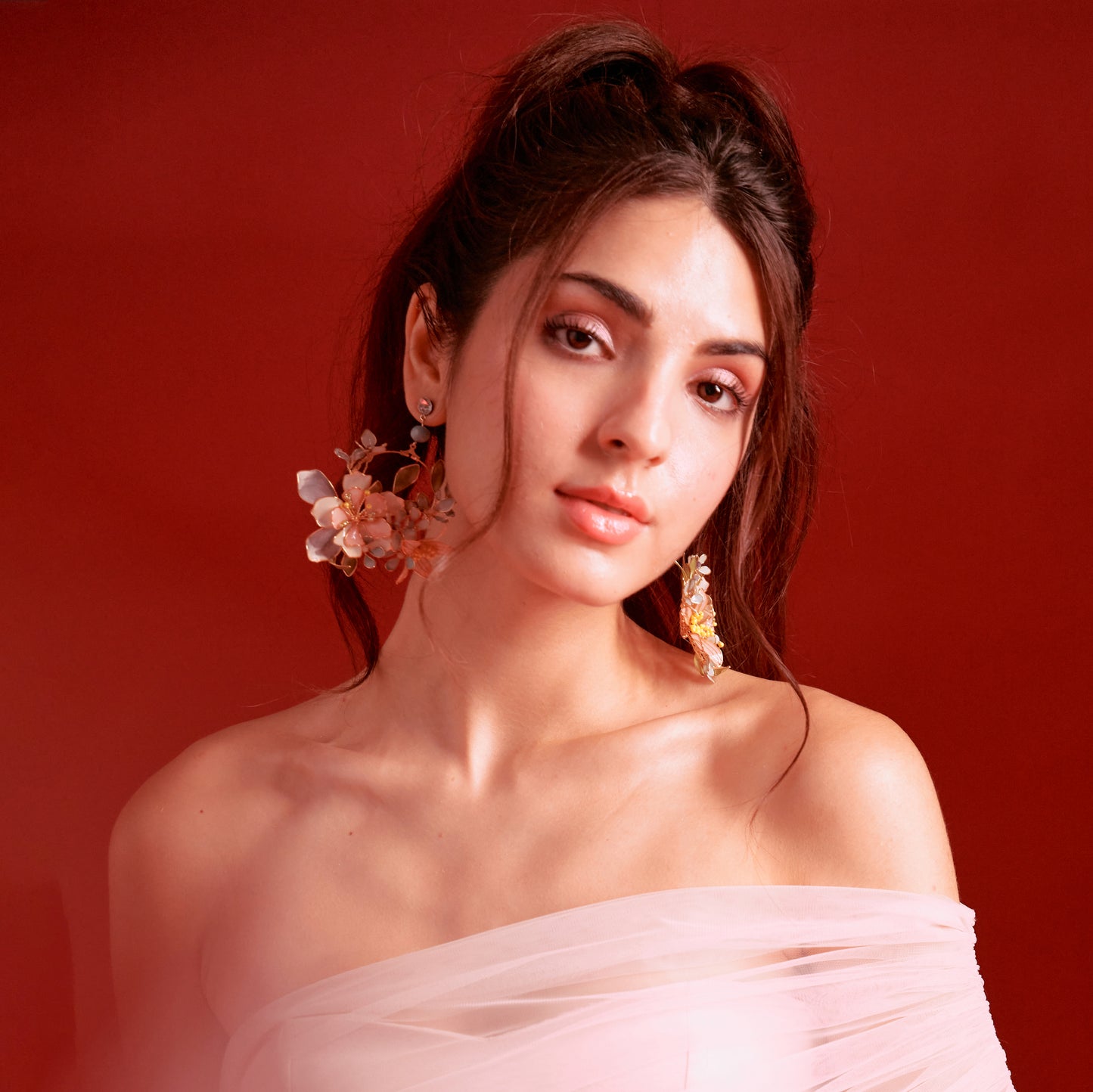 Customer wearing Zahara handcrafted resin floral hoop earrings at Indian wedding — The Vintage Snob